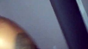 A black girl gives a good blow job to a big black cock