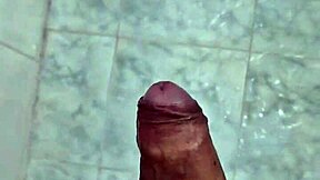 novinho dotado jerks off in shower until he cums