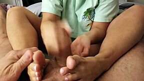 Young wife gives a footjob and gets a facial from an amateur husband