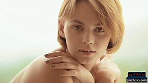 Small-framed teenage model strips and reveals all