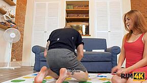 Teen girl gets distracted during Rim4K Twister game