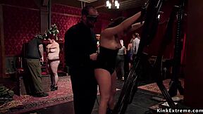 Two submissives suffer punishment in a wild orgy