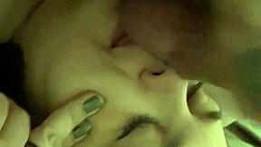 Close up of a face that is enjoying licking balls