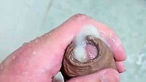Beautiful gay twink’s solo bath time with a special addition