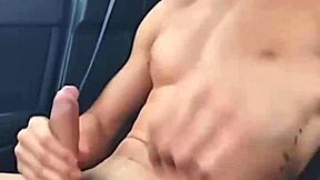 Hot young gay guy masturbates in his car