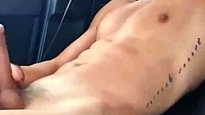 Hot young gay guy masturbates in his car