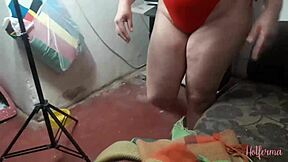 A big-chested amateur uses a chair to satisfy her partner in a cuckold fantasy