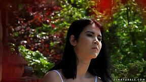 Beautiful brunette has outdoor sex with a black-haired man