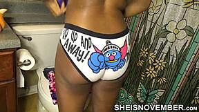 Beautiful African American girl in slow motion undressing