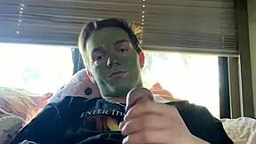 Fit jock strokes his cock during skin care routine