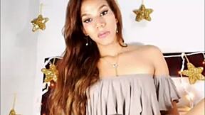 Beautiful transgender model showing off her big cans and stroking off on cam