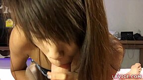 Young Asian shemale Pimmie gives great blow job and anal sex