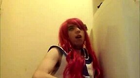 Redhead crossdresser's solo performance with a happy ending