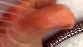 A Hungarian amateur shows her feet while she washes up