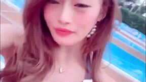 Japanese beauty shows off her curves in a sultry dance routine