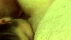 An overweight girl gives a blow job to my small penis