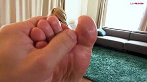 Beautiful amateur Jasmine Rouge gives great foot job and facial