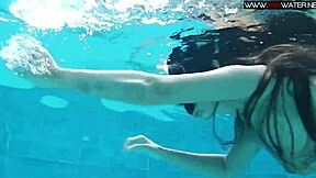 Diana Kalgotkina swims naked in the pool