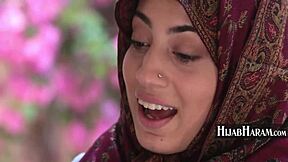 Hijab-clad Muslim woman seduces black men in Arab hood