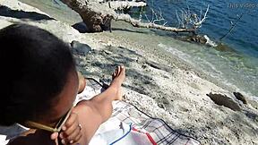 Public beach fun with wife jerking and sucking me off