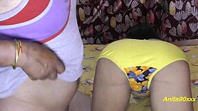 Anita Bhabhi gets her ass spanked with a big dildo