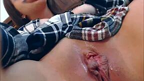 A hot girl pleasuring herself with a sex toy