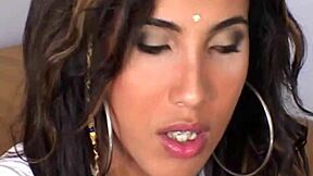 A shemale's ass hole is filled with a big black dick