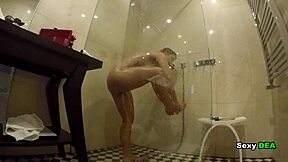 Tan lines accentuate a goddess's wet, sexy shower routine