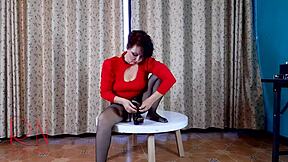 Nice lady in pantyhose and heels strips at round table c1