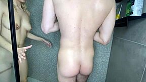 A beautiful woman has a hot shower with a handsome man who is a friend of her boyfriend