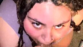 Big black cock penetrates the mouth of a chubby girl in a porn video
