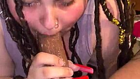 Big black cock penetrates the mouth of a chubby girl in a porn video