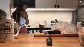 Young wife does the household chores while being secretly filmed by a voyeur cam