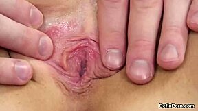 A beautiful girl with natural breasts opens her vagina and loses her virginity