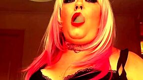 Chubby British dominatrix Tina Nua smokes a Superking