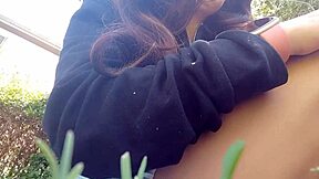 chantal channel peeing on grass in sexy close-up.