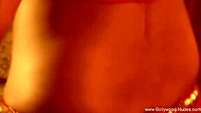 Pretty Asian dancer performs erotic belly dance