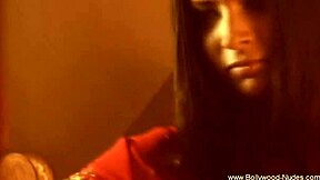 Pretty Asian dancer performs erotic belly dance