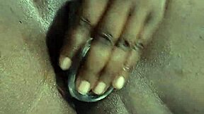 Black beauty squirts while being stimulated by a toy
