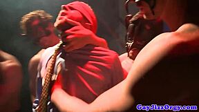 Muscular men engaging in group sex and masturbation