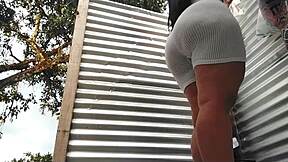 Beautiful mother-in-law shows off her big ass in a bikini outside