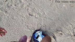 A beautiful woman with an amazing set of large natural breasts and a perfect ass enjoys rough sex with a stranger at a nudist beach