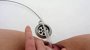Pissing pussy compilation featuring a milf urinating in bath with amateur close-ups asmr