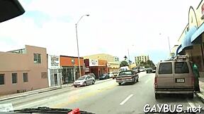 Two muscular men engaging in oral sex acts