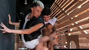 Gay twink gets hardcore action at gloryhole bar