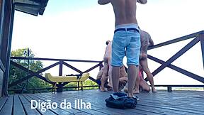 Beautiful redhead gets her ass spanked on the balcony