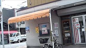 Public pleasure at Nakamura Eigeki: Gay masturbation and blowjob action