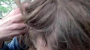 Gay couple having fun with a morning blowjob in a car