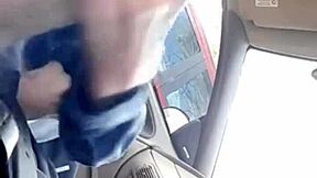 Gay couple having fun with a morning blowjob in a car
