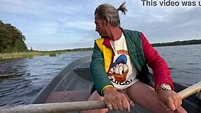 Amateur couple’s funny outdoor sex on the lake in a boat